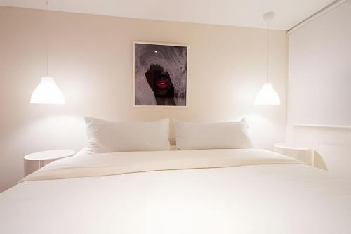 Postel nebo postele na pokoji v ubytování Marmulata Rooms