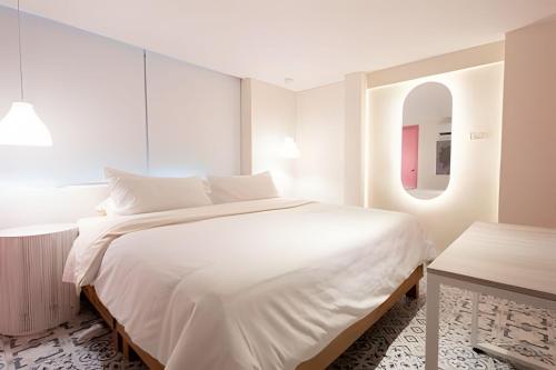 Postel nebo postele na pokoji v ubytování Marmulata Rooms