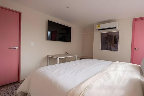 Postel nebo postele na pokoji v ubytování Marmulata Rooms