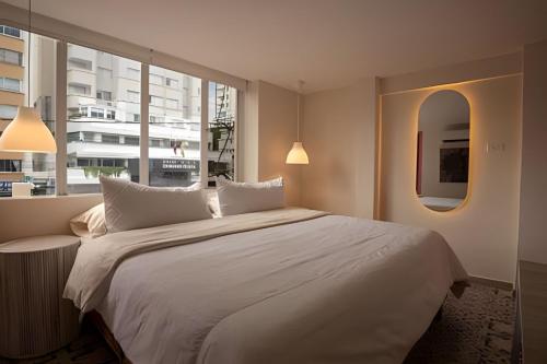 Postel nebo postele na pokoji v ubytování Marmulata Rooms