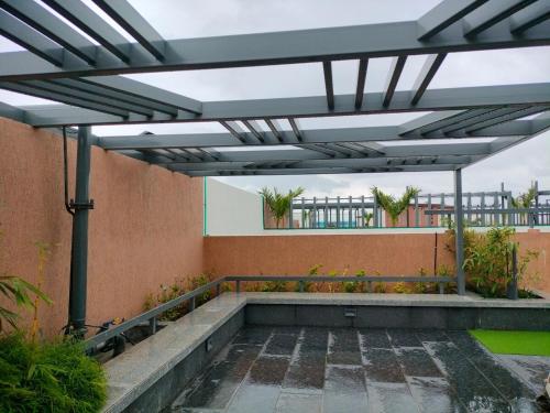 Сад в Casa Teal Near Airport Symbiosis Viman Nagar