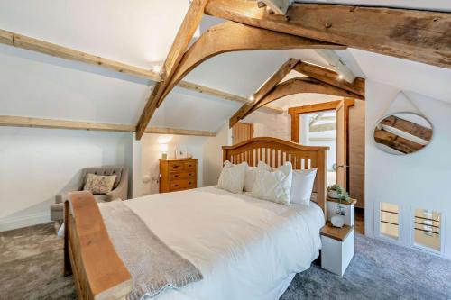 Ένα ή περισσότερα κρεβάτια σε δωμάτιο στο Kelly Mill Cottage