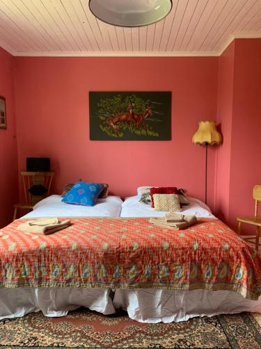 Ένα ή περισσότερα κρεβάτια σε δωμάτιο στο Strömma Farmlodge B&B