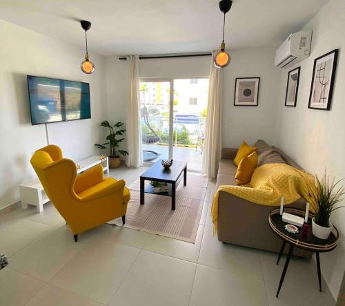 Ruang duduk di Family apartment in Punta Cana