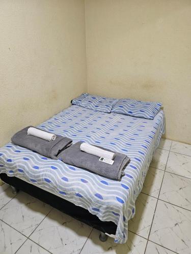 Katil atau katil-katil dalam bilik di Casa Recife Conforto 1