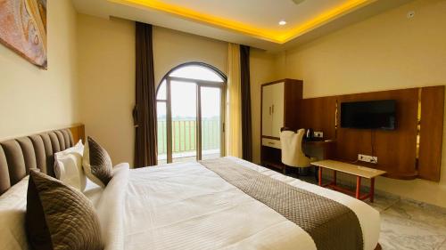 Postel nebo postele na pokoji v ubytování Yaan Resort