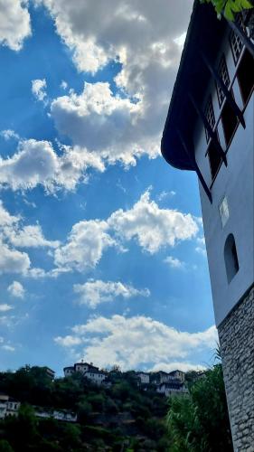 a view of a blue sky with white clouds at Çelo's house Gjirokaster in Gjirokastër