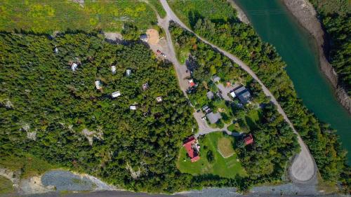 an overhead view of a farm with trees and a road at Dominion Hill Country Inn in Bocabec