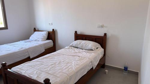 appartement les orangesにあるベッド