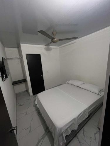 Postel nebo postele na pokoji v ubytování Hotel GB
