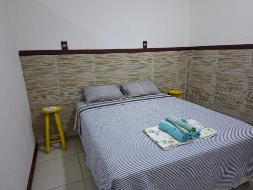 Katil atau katil-katil dalam bilik di Ótimo apartamento próximo ao centro