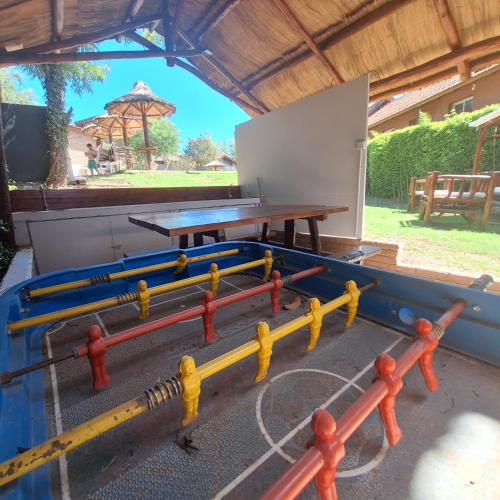 a ping pong table and a ping pong ball at Hotel Antiguo Camino in Villa General Belgrano