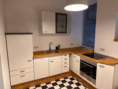 Køkken eller tekøkken på WOW schicke Loftwohnung, Appartement Wifi, Minibar