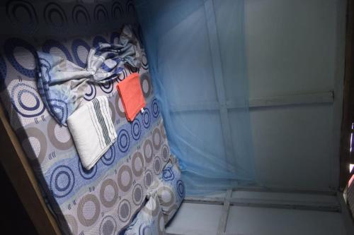 Postel nebo postele na pokoji v ubytování Hostal El manglar