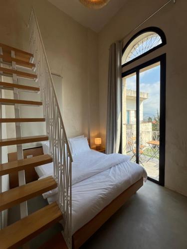 Llit o llits en una habitació de Neoli-Room Kaf