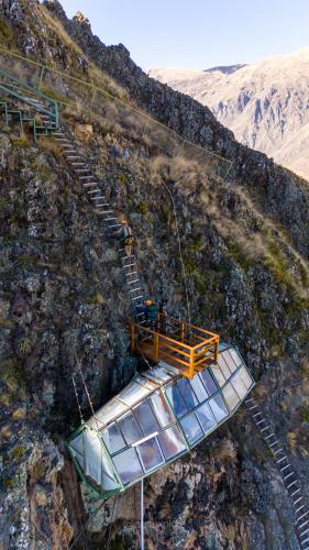 a set of stairs on the side of a mountain at Vertical Sky Suites in Ollantaytambo