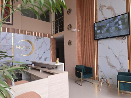 TV a/nebo společenská místnost v ubytování MOON Edificio