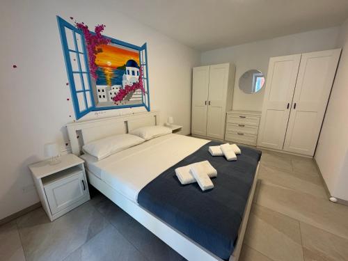Postel nebo postele na pokoji v ubytování MediTerra Apartments