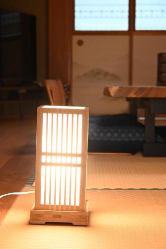 a light sitting on a table in a room at Japanese Light - Vacation STAY 00130v 