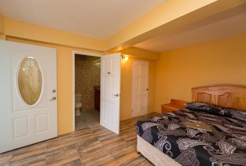 Postel nebo postele na pokoji v ubytování Sapphire Villa 4