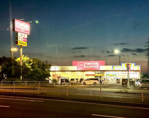 a gas station with cars parked in front of it at Rodman TONE A102 - Vacation STAY 06233v in Kitakyushu