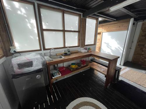 Kuchyň nebo kuchyňský kout v ubytování Hotu's Bungalow