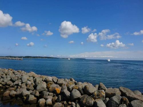 a large group of rocks on the water at 3 person holiday home in Kerteminde-By Traum in Kerteminde