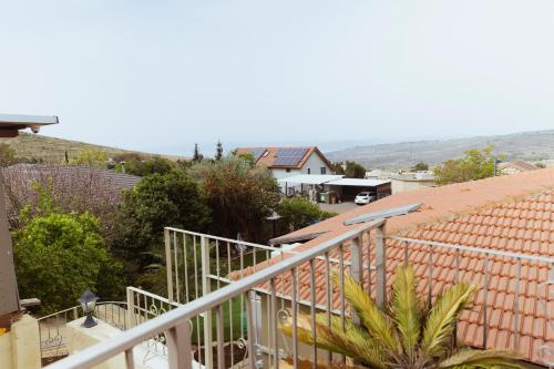 a view from the balcony of a house at mimar מימאר אירוח כפרי מפנק in Had Nes