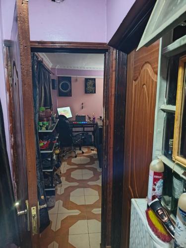 an entrance to an office with a desk in a room at Bahati Homes in Eldoret