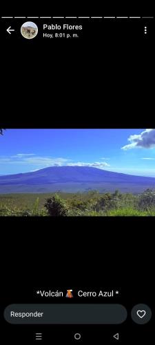 a screenshot of a screen with a view of a field at Isla Sol Boutique in Puerto Villamil