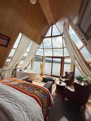 Katil atau katil-katil dalam bilik di TiticacaMarka lodge