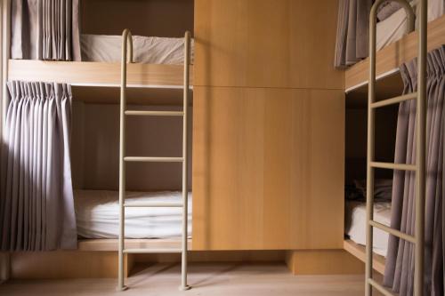 Katil atau katil-katil dalam bilik di 慢想旅宿Bluesean Hostel