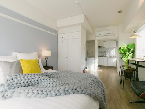 Postel nebo postele na pokoji v ubytování Aiwa Mansion / Vacation STAY 80391