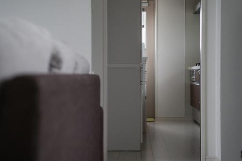 an open door to a kitchen in a room at Itoman - House / Vacation STAY 7483 in Itoman