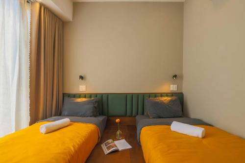 Postel nebo postele na pokoji v ubytování Vừng Hotel