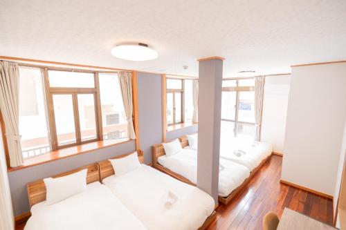 Postel nebo postele na pokoji v ubytování Tsubogawa Building 2F - Vacation STAY 7749