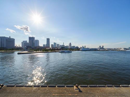 a view of a river with a city in the background at RetroSpect Stay Yokohama - Vacation STAY 99033v in Yokohama