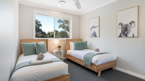 Postel nebo postele na pokoji v ubytování Sommarhuset - 3 Mins Walk to the Beach