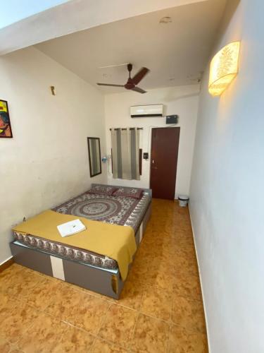 Кровать или кровати в номере La Ruelle Guest House