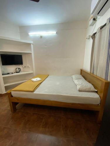 Кровать или кровати в номере La Ruelle Guest House