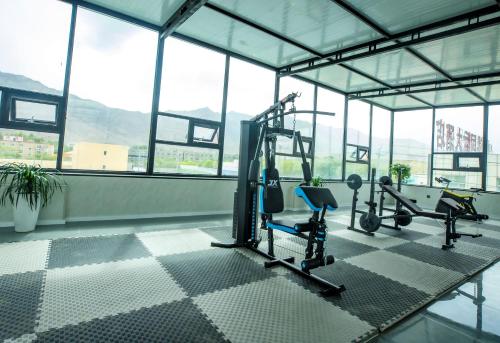 Fitness centrum a/nebo fitness zařízení v ubytování Xingang International Hotel