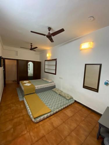 Кровать или кровати в номере La Ruelle Guest House