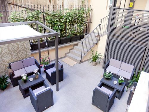Een patio of ander buitengedeelte van Quirinale Luxury Rooms