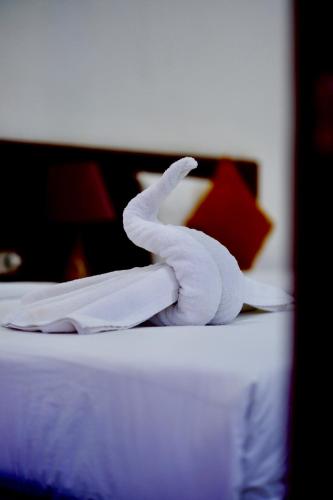 Una cama o camas en una habitación de Alba Tulamben