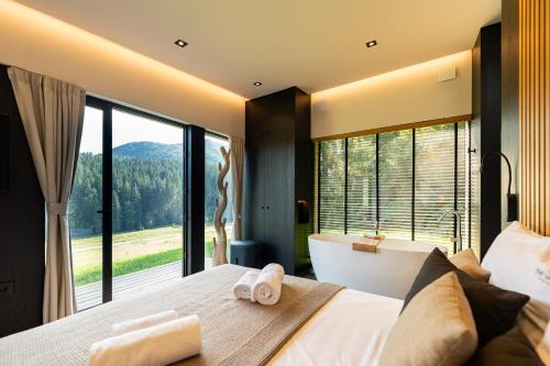 Postel nebo postele na pokoji v ubytování The Valley Resort