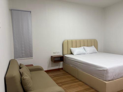 Postel nebo postele na pokoji v ubytování The Six Resort Lopburi