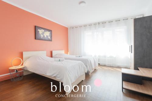 Ένα ή περισσότερα κρεβάτια σε δωμάτιο στο Nancy Plein Centre 6 Voyageurs