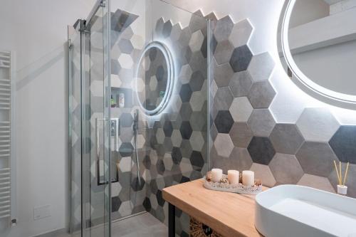 a bathroom with a shower and a sink at Charming Tuscan Stone House in Pescaglia