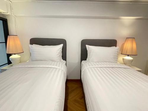 Postel nebo postele na pokoji v ubytování Sleep Walker Poshtel