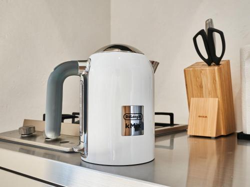 a toaster sitting on a kitchen counter with a knife at Rakuten STAY VILLA Awaji 105 3 bank beds, Capacity of 9 persons in Minamiawaji